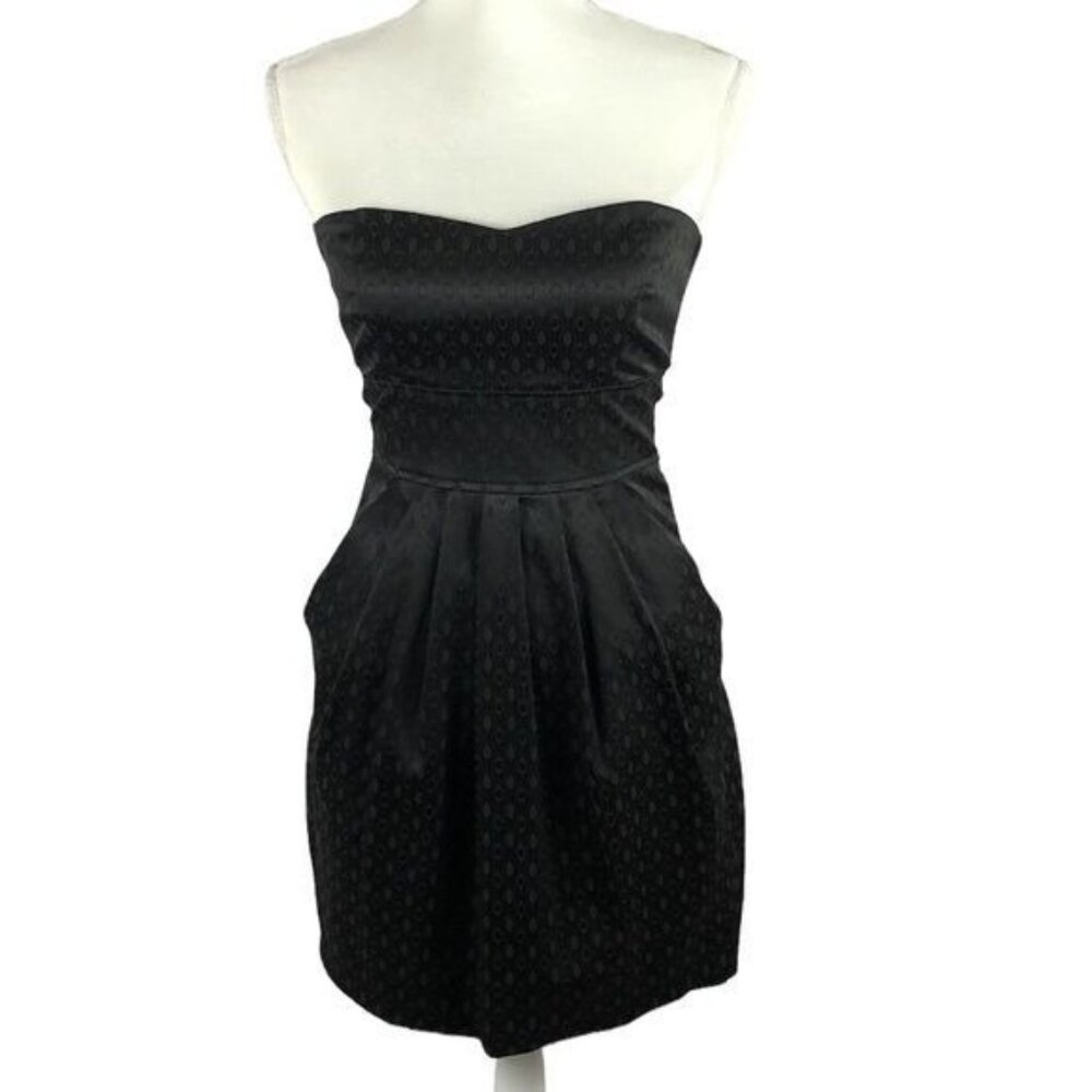 B. Darlin black strapless dress with pockets size 5/6